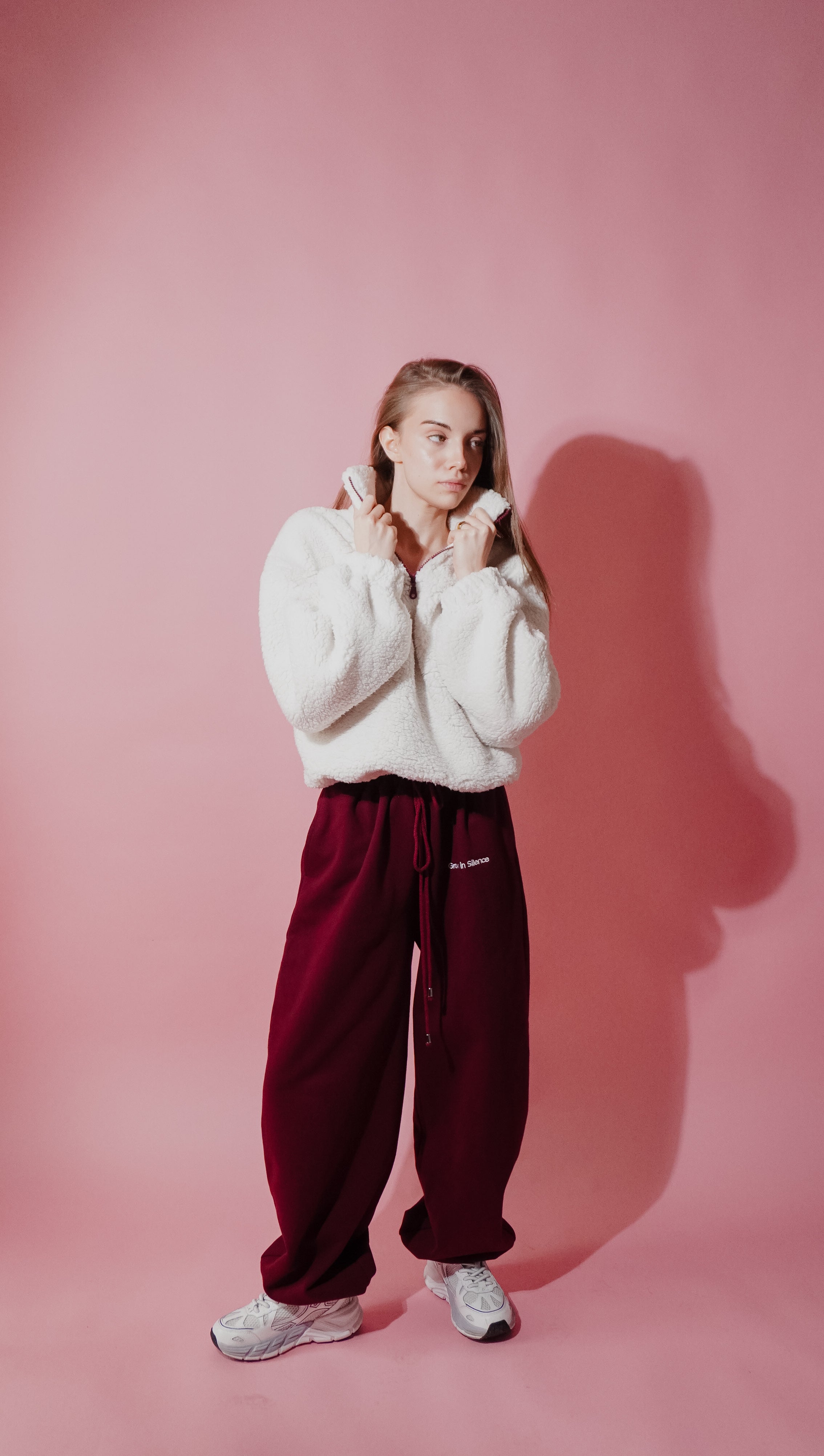 Female model styling Grown in Silence fleece anorak with relaxed oversized fit — premium streetwear from Prague