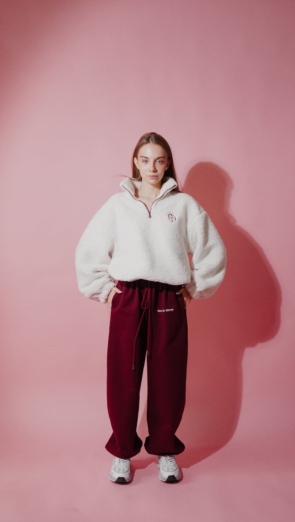 Female model wearing GIS fleece anorak with full outfit styling — minimalist streetwear lookbook