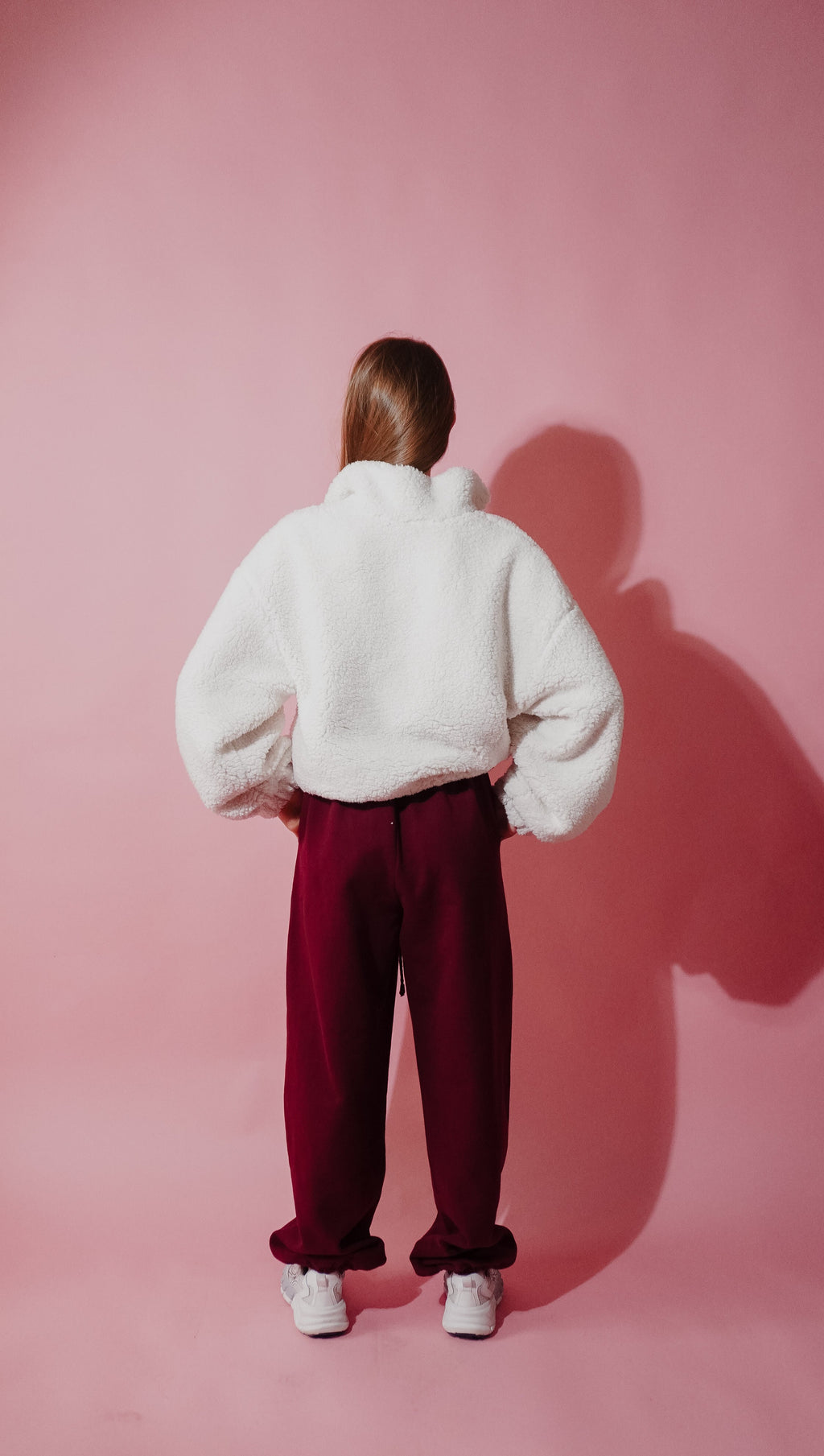 Oversized fleece anorak side view — barrel sleeve construction and dropped shoulder silhouette, made in Europe
