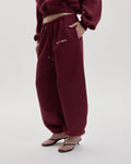 Grown In Silence barrel joggers in Ruby Wine, full length front view