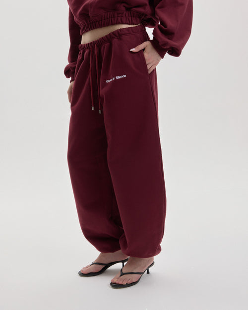 Grown In Silence barrel joggers in Ruby Wine, full length front view