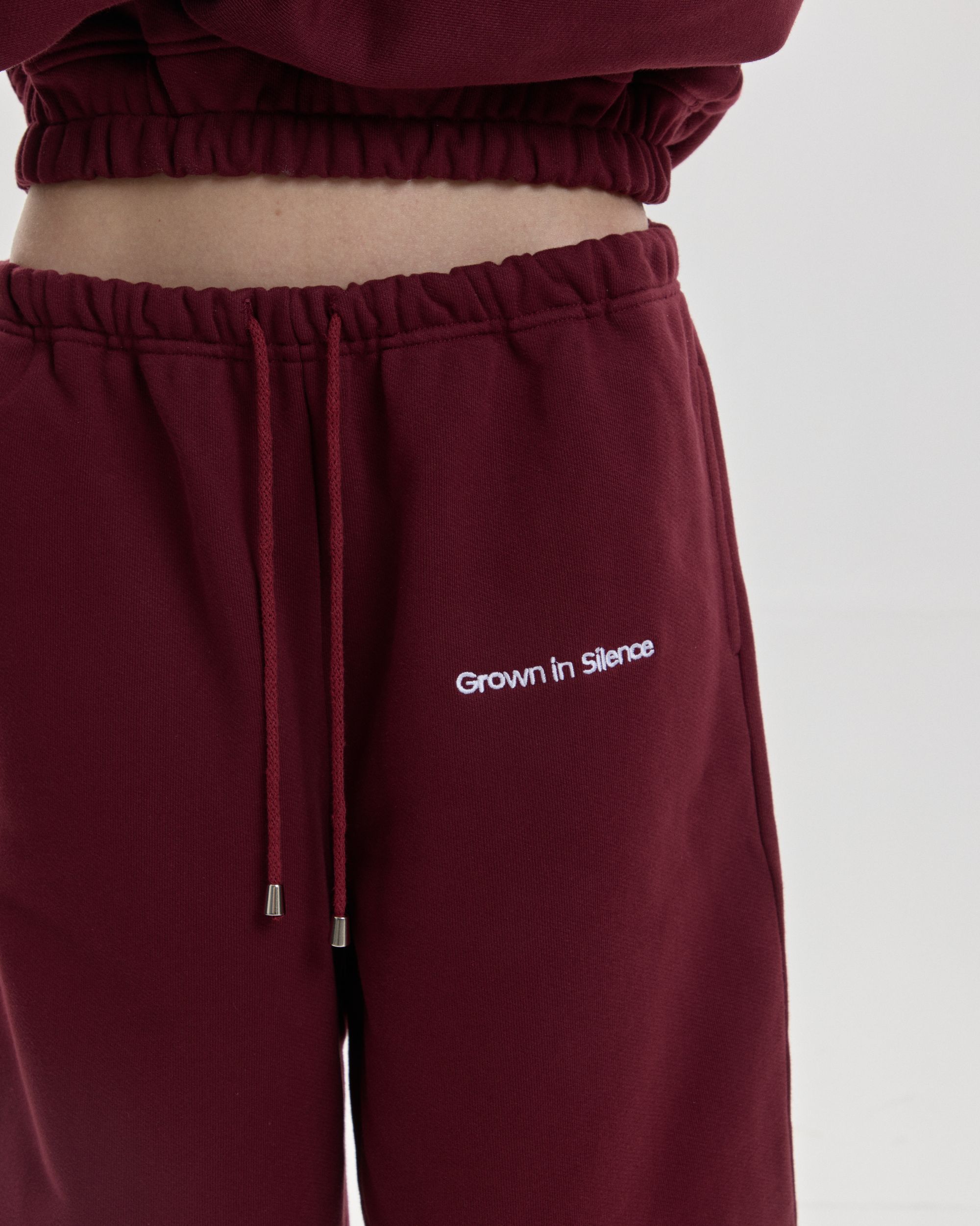 Grown In Silence barrel joggers in Ruby Wine, waistband and logo detail