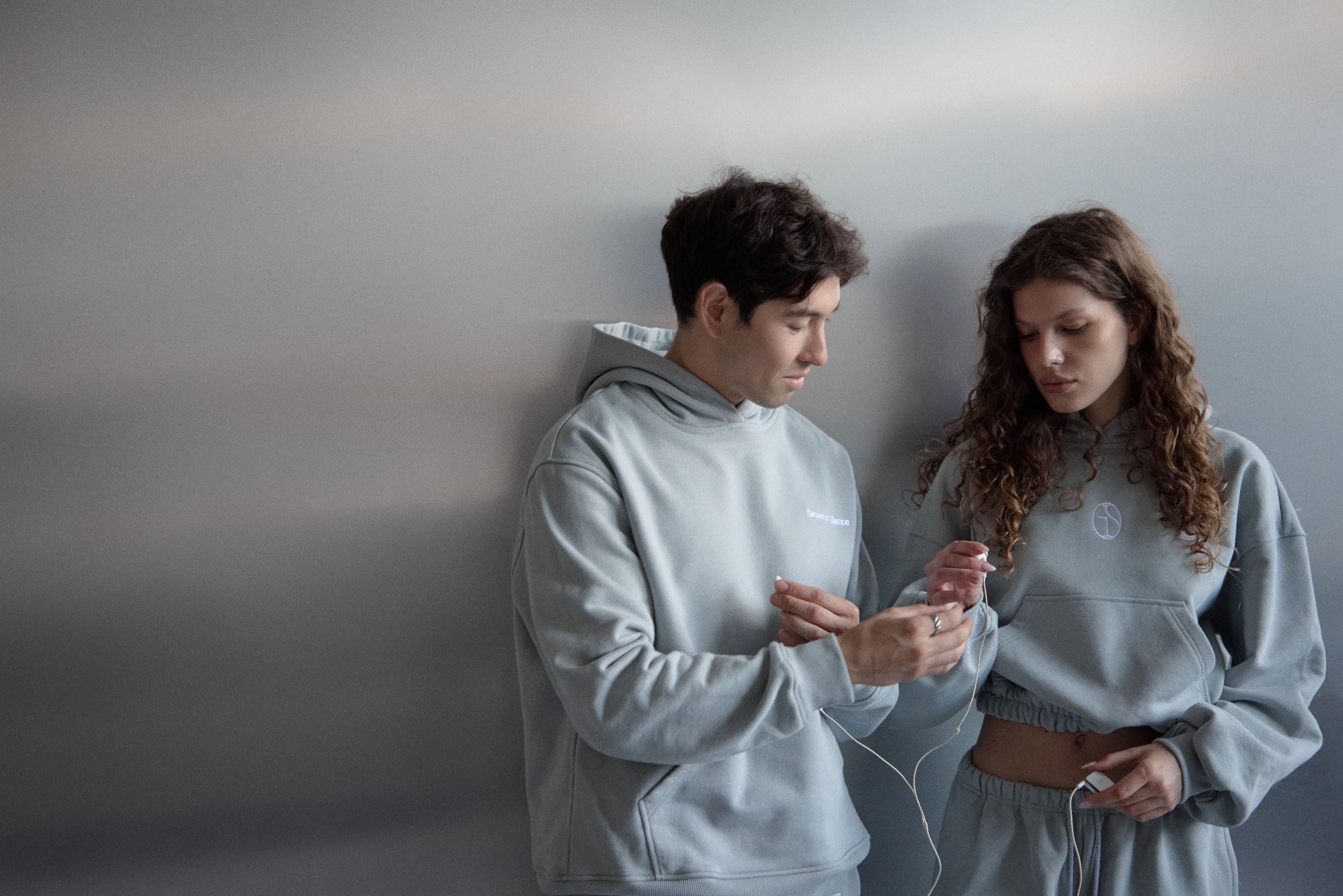 Grown In Silence lookbook, couple in Cloud Metallic hoodies