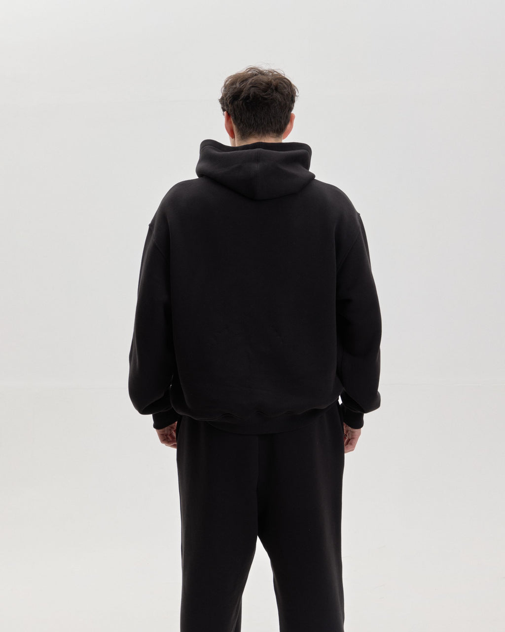Grown In Silence oversized hoodie in Midnight Black, back view