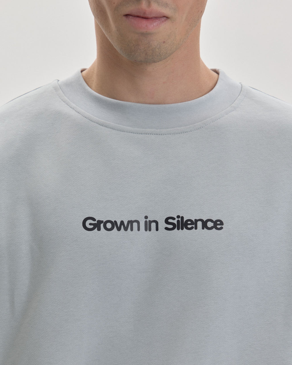 Grown In Silence oversized unisex tee in Cloud Metallic, chest logo detail