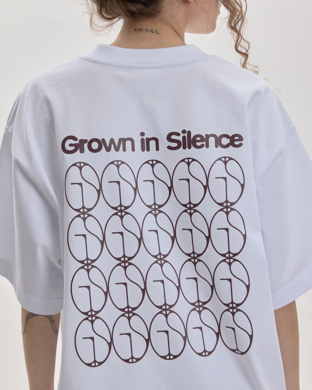 Grown In Silence oversized unisex tee in Raw White, back print detail with GIS pattern