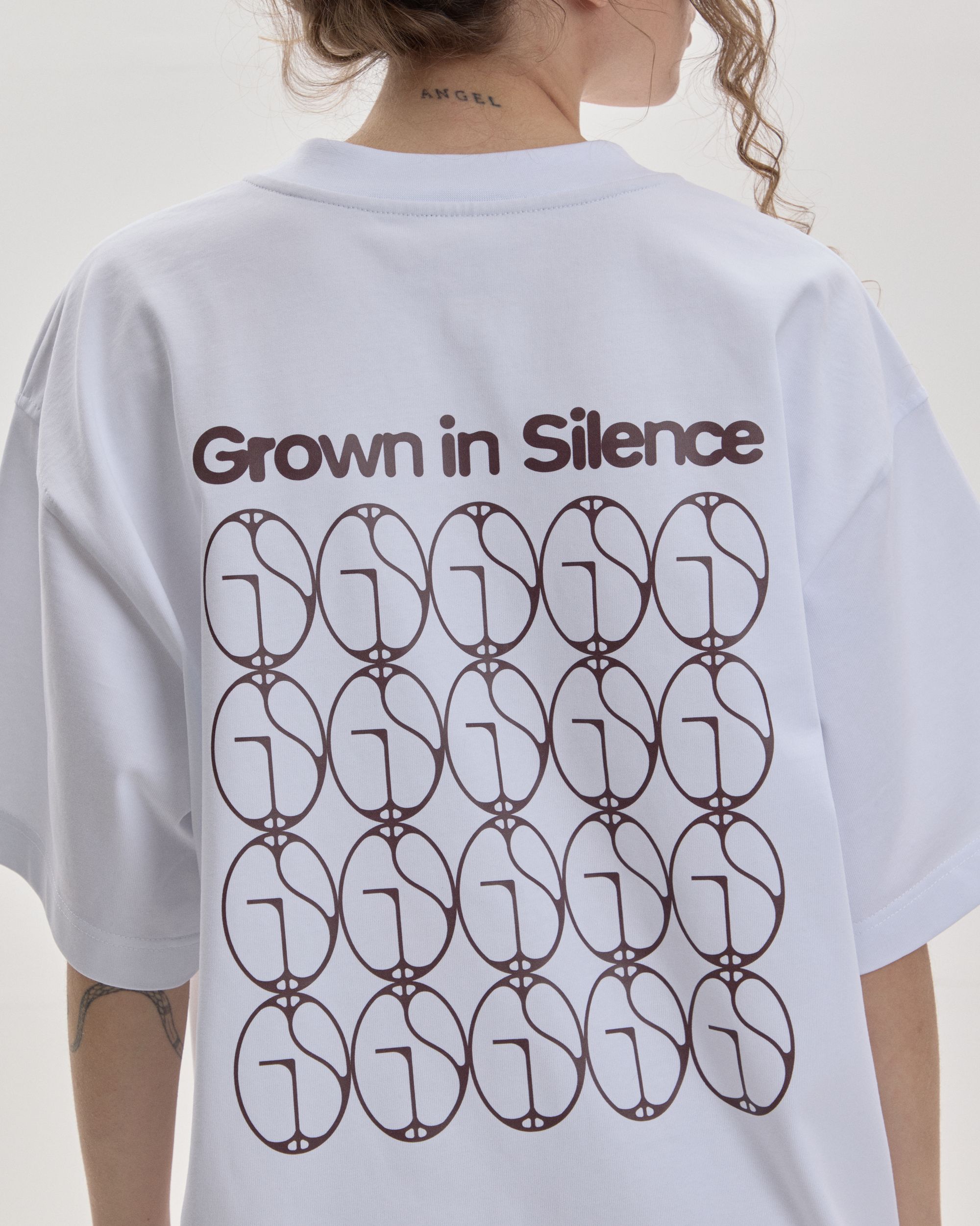 Grown In Silence oversized unisex tee in Raw White, back print detail with GIS pattern