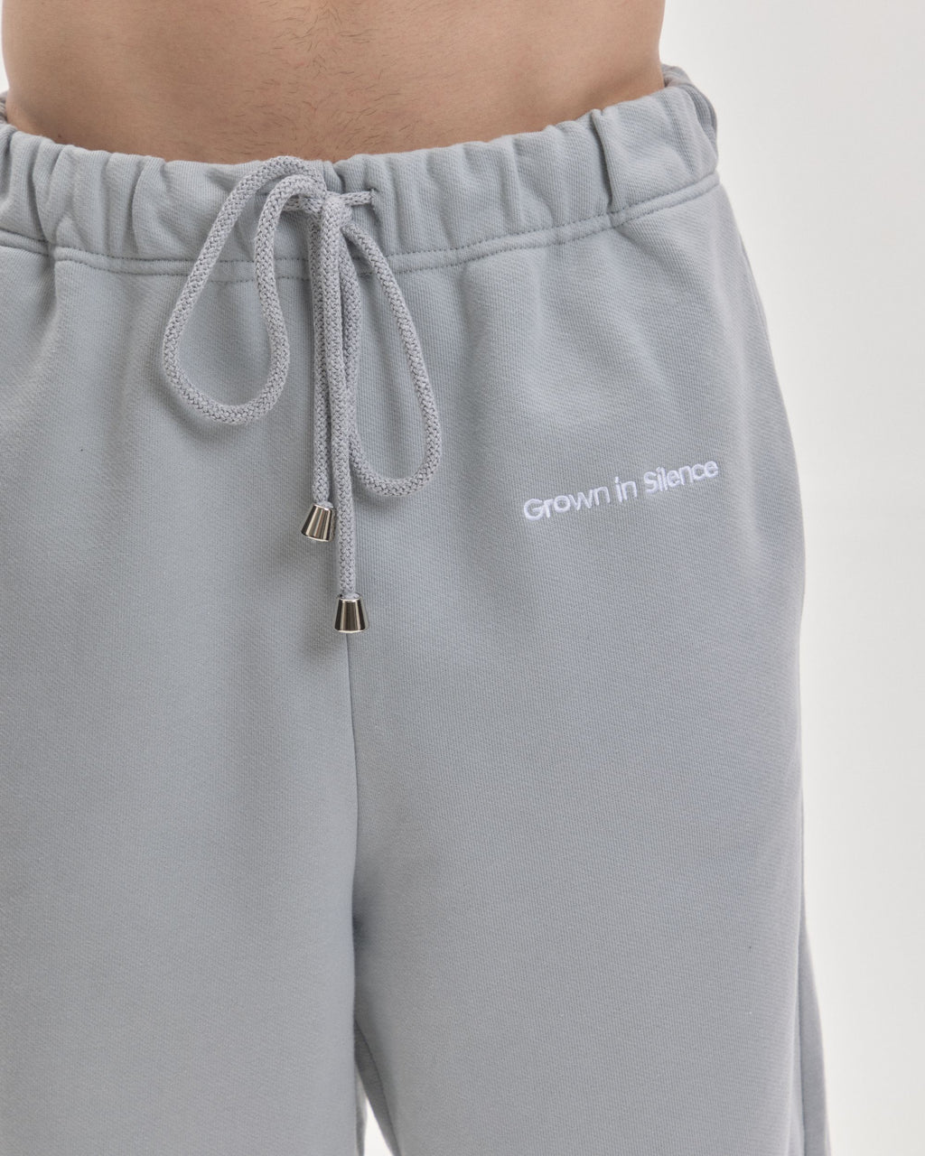 Grown In Silence relaxed joggers in Cloud Metallic, waistband and drawcord detail