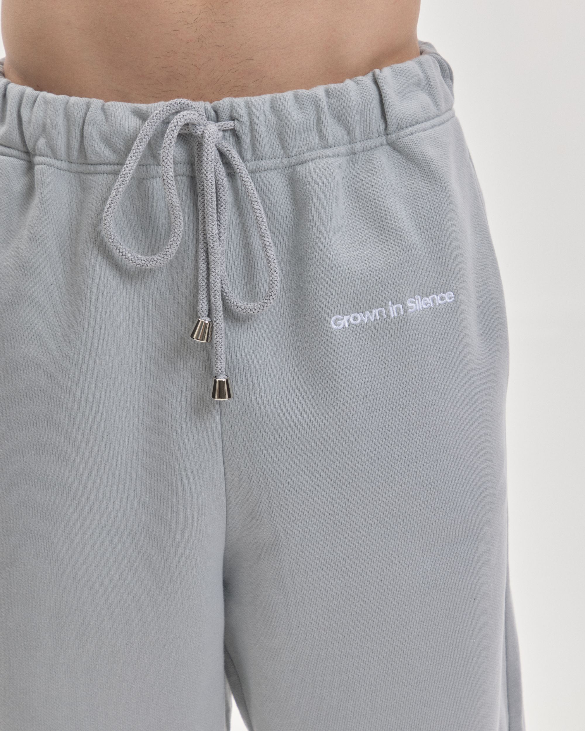 Grown In Silence relaxed joggers in Cloud Metallic, waistband and drawcord detail