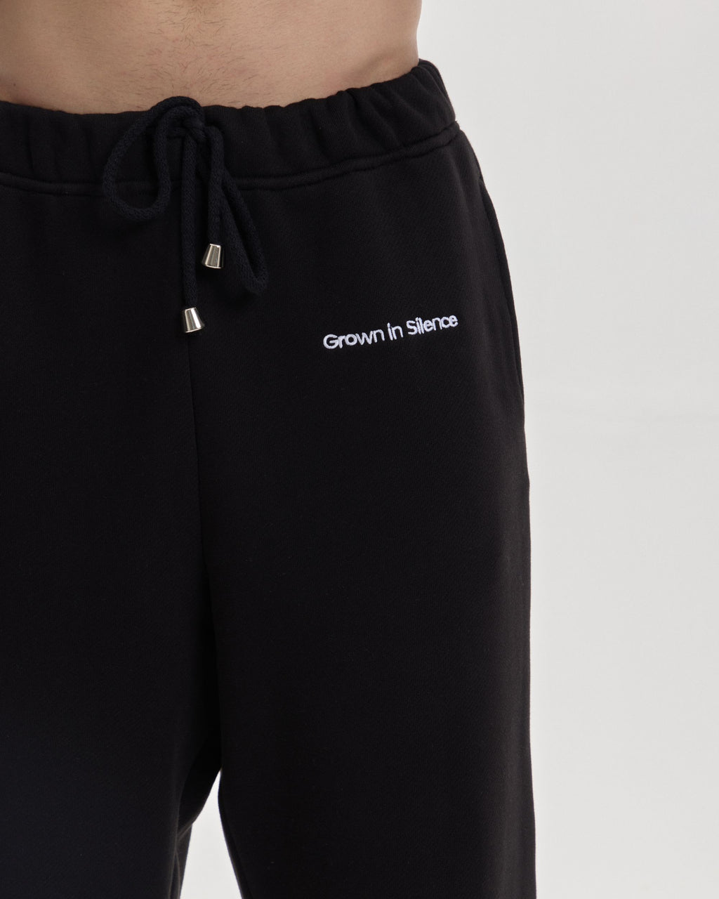 Grown In Silence relaxed joggers in Midnight Black, waistband and drawcord detail